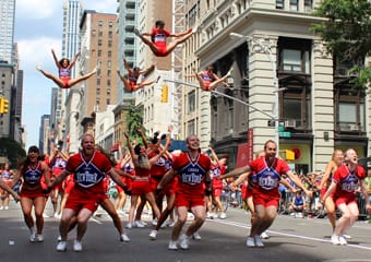 The Cheer New York team performing stunts.