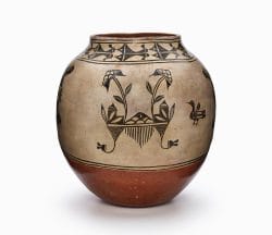 A Cochiti olla with floral designs, waterbird pictorials, and a rust bottom.
