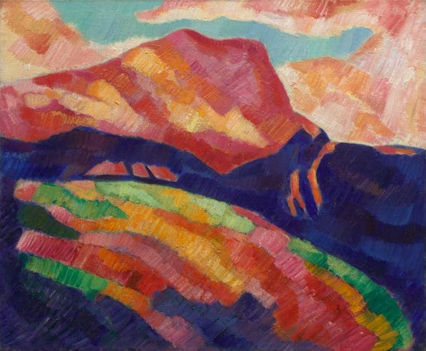 Painting of a mountain ridge in navy and pink surrounded by a landscape of warm pinks, reds, and green.