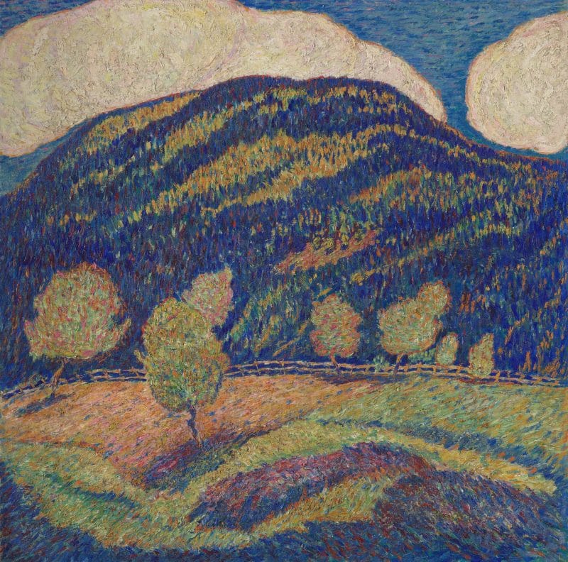 A landscape of a vacant hill using prominent shades of blue, brush markings are impressionistic and create texture within the painting.