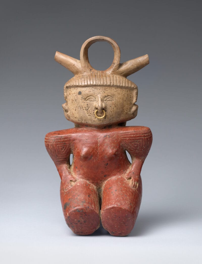 Kneeling woman with a red body and squared shoulders, flat squared face, nose-ring and abstract headpiece.
