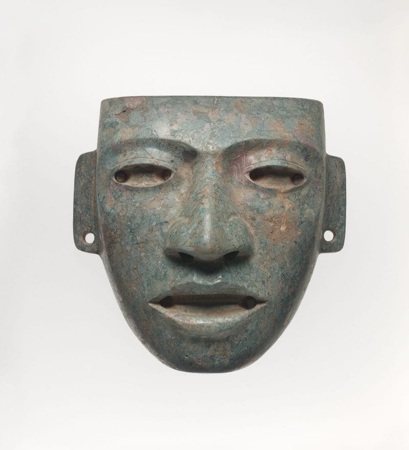 A naturalistic mask with large eyes, a broad pointed nose, and open mouth.