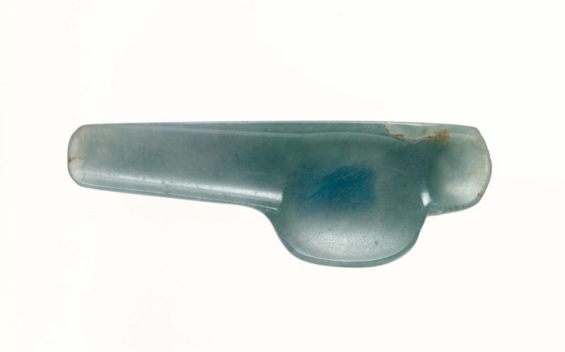 Blue-green jade spoon with a flat rounded handle.