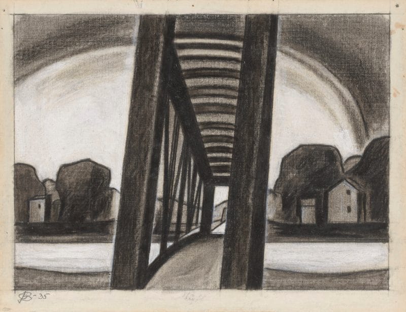 Landscape featuring trees and houses seen through the center of a bridge.