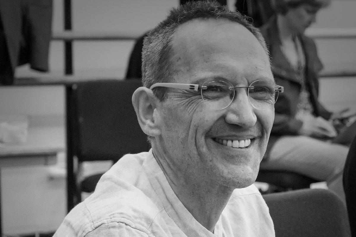 A black and white photo of Osvaldo Golijov