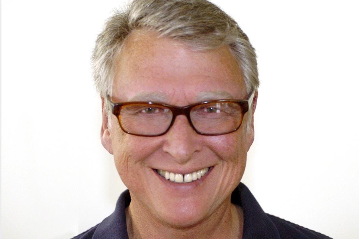 A photo of Mike Nichols against a white background.