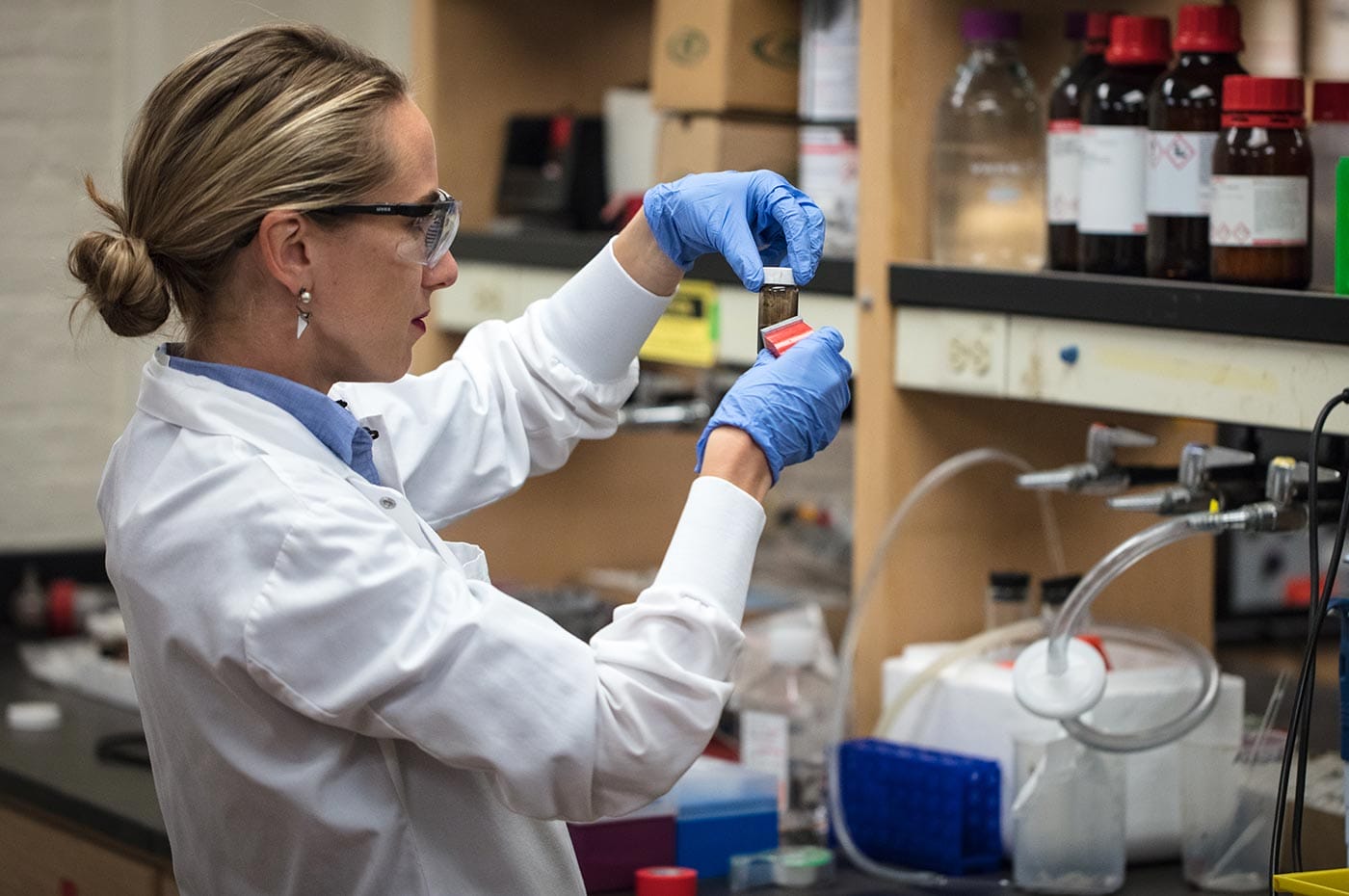 Polina Anikeeva working with magnetic nanoparticles in her lab at MIT