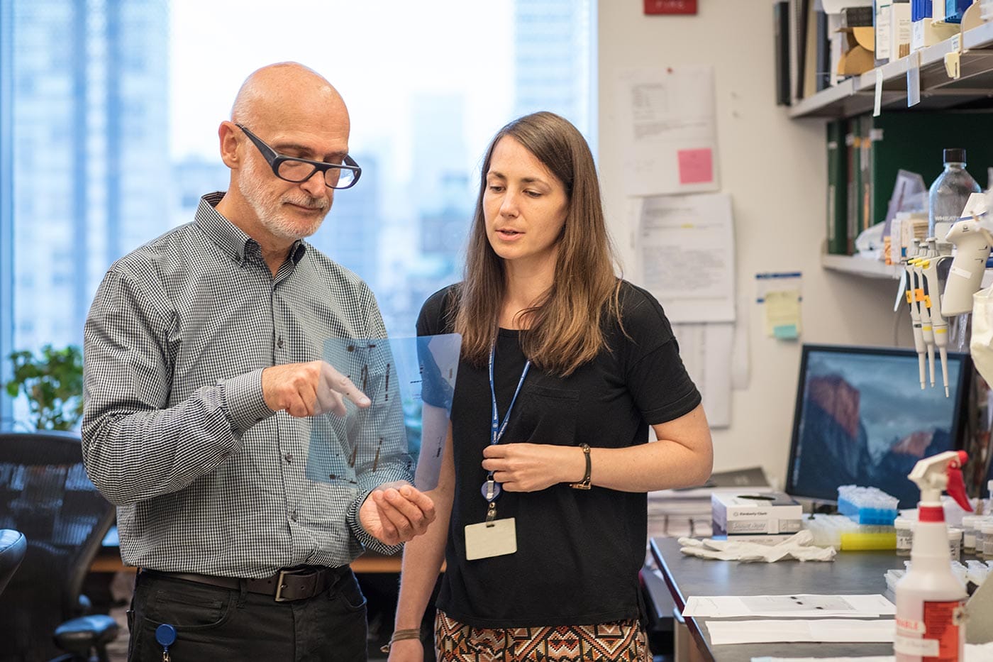 A photo of Alexander Rudensky and a student