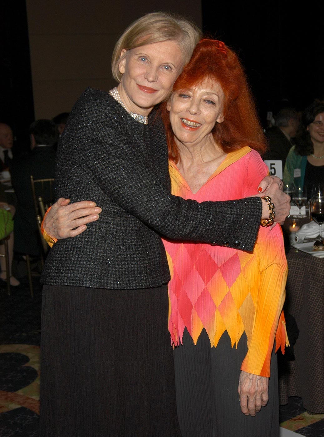 Marica Vilcek and Jeanne-Claude in an awards gala ballroom.