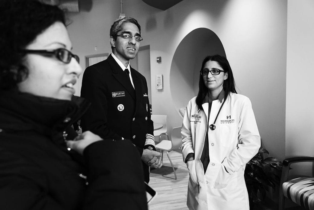Black and white photo of Dr. Vivek Murthy and Dr. Mona Hanna-Attisha.