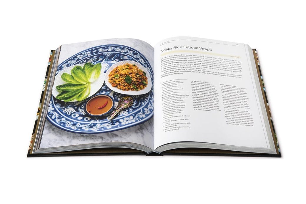Interior view of a cookbook featuring a colorful dish and recipe.