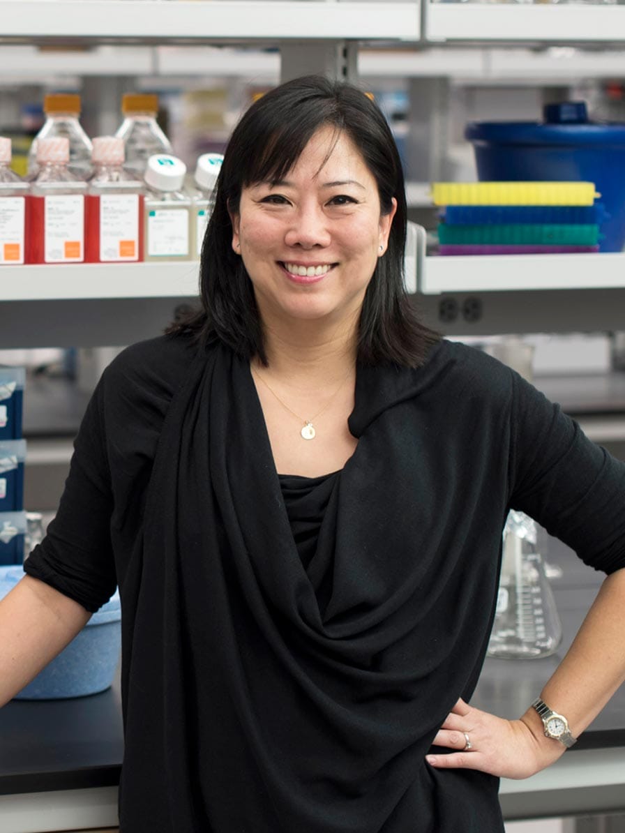 Heran Darwin standing in her lab at New York University.