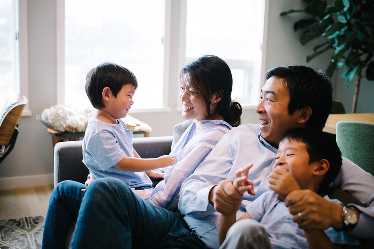 Andrew Yang with wife Evelyn Yang and their sons.