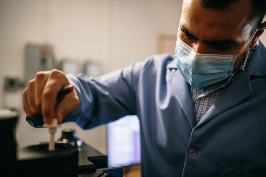 Mohamed Abou Donia testing a sample in his lab at Princeton University.