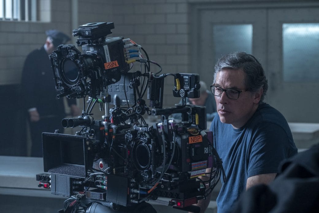 Rodrigo Prieto behind a high-tech film camera on the set of The Irishman.