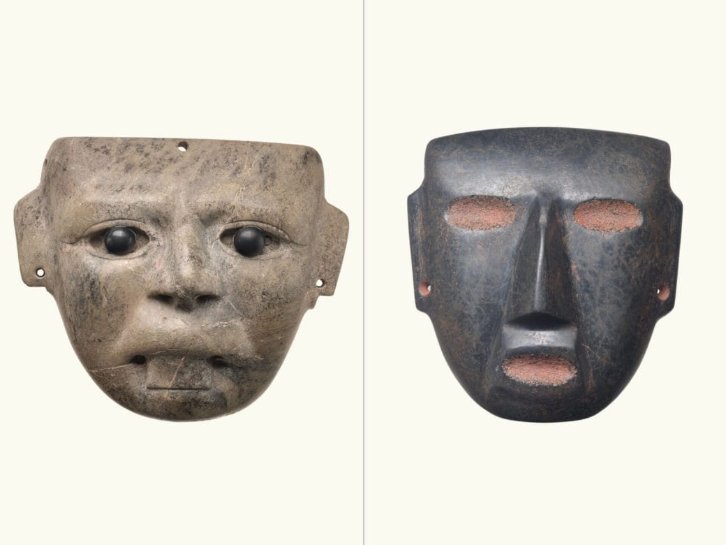 A comparison of two masks: beige mask with black pupils (left) and a dark mask with red eyes and mouth (right).