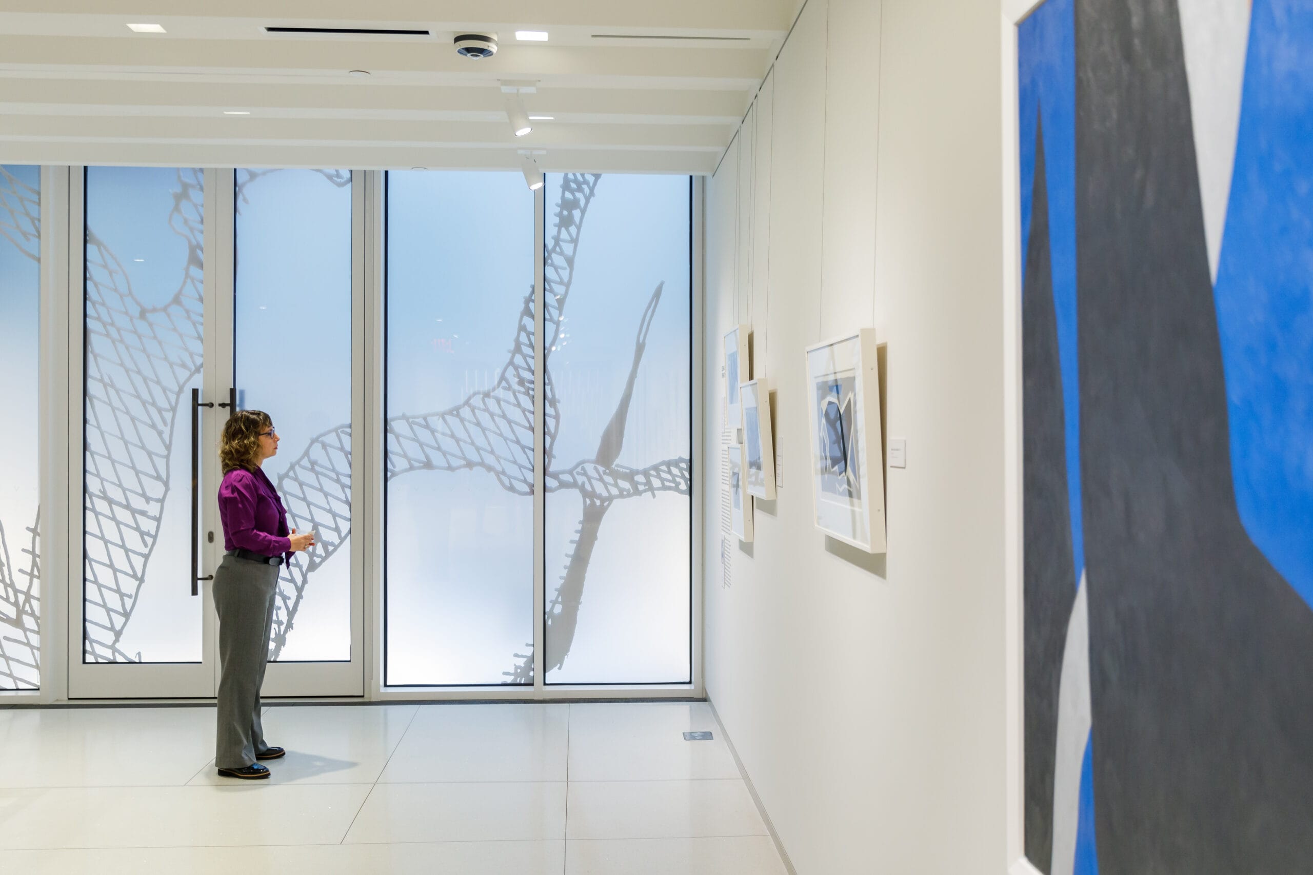 The second floor gallery space with floor to ceiling windows.