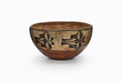A Cochiti dough bowl with motifs of rain and clouds.