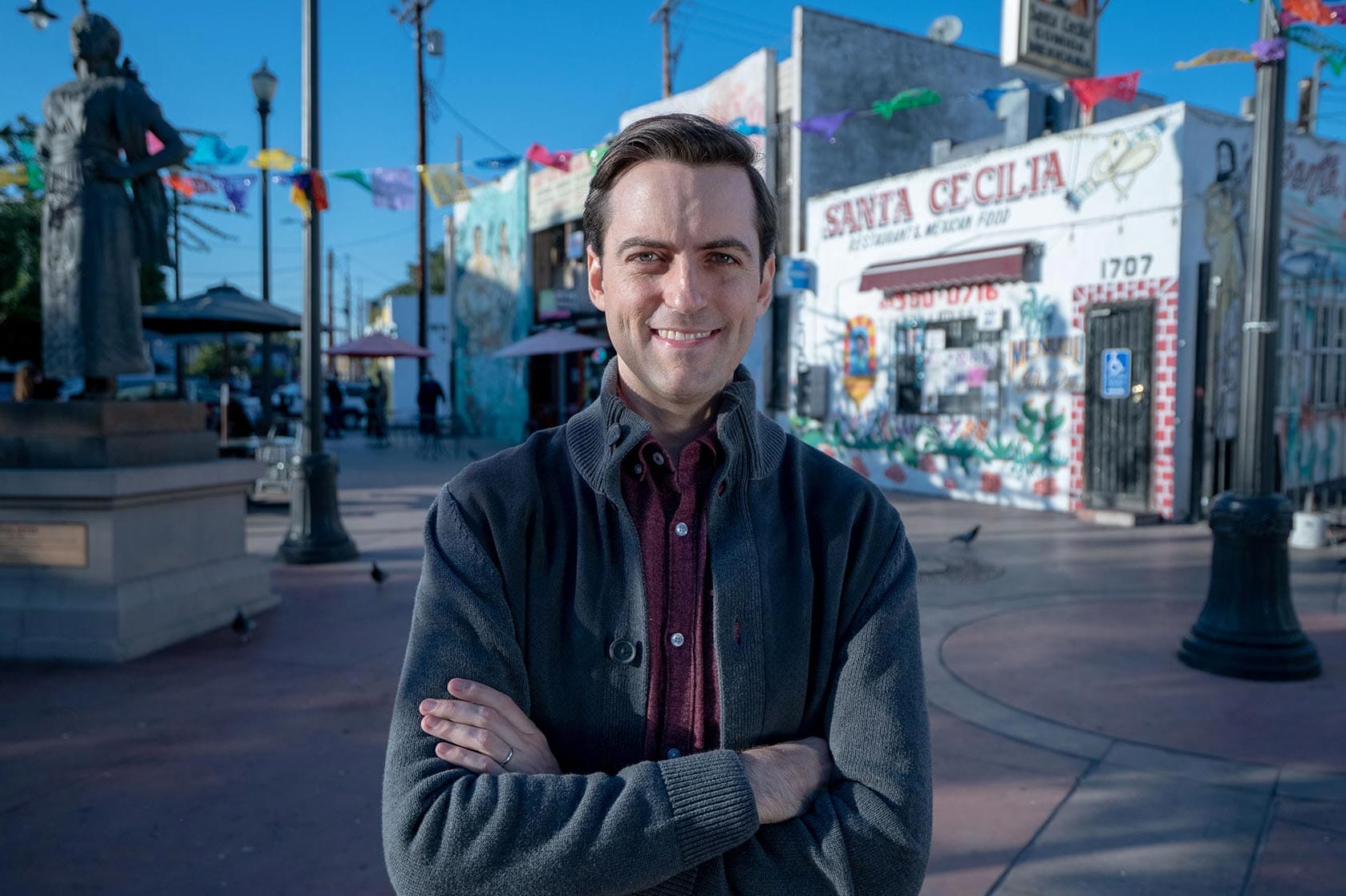 Juan Pablo Contreras standing in Mariachi Plaza in Los Angeles.