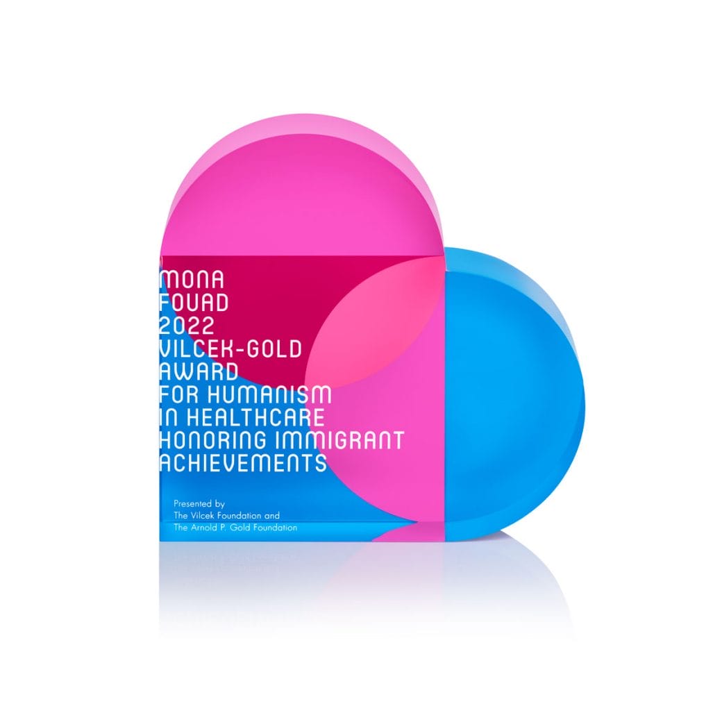 The Vilcek-Gold heart-shaped commemorative trophy in shades of pink and blue.
