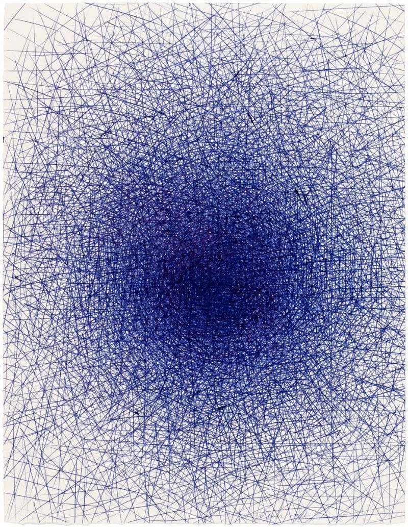 Blue pen sketched on paper to form a circular shape that gradually becomes lighter in color as the pen strokes spread out from the middle.