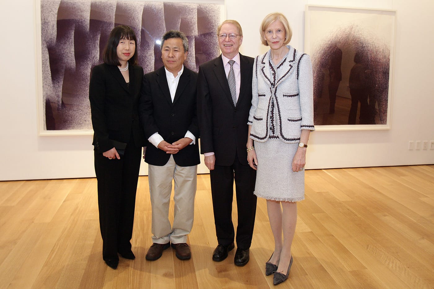 Jung Lee Sanders with Il Lee, Jan Vilcek, and Marica Vilcek.