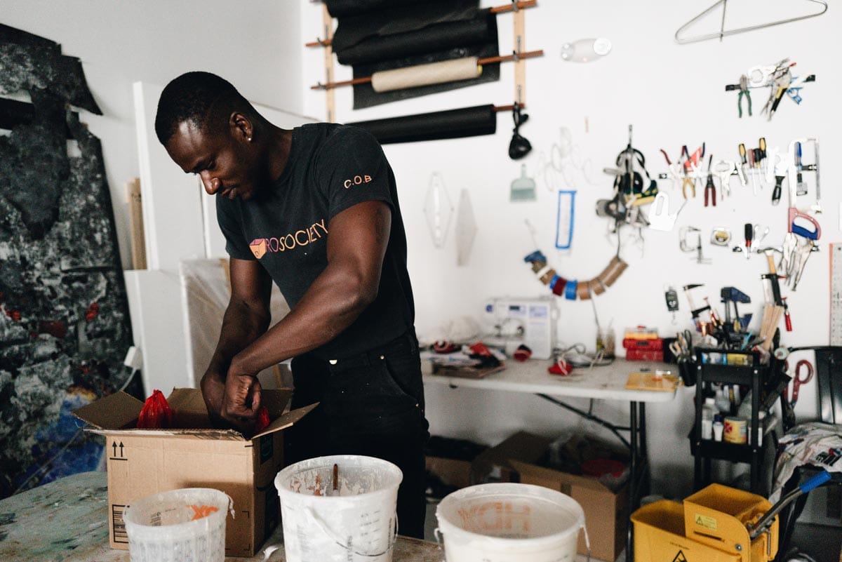 Jeffrey creating a mould out of plaster in his studio.