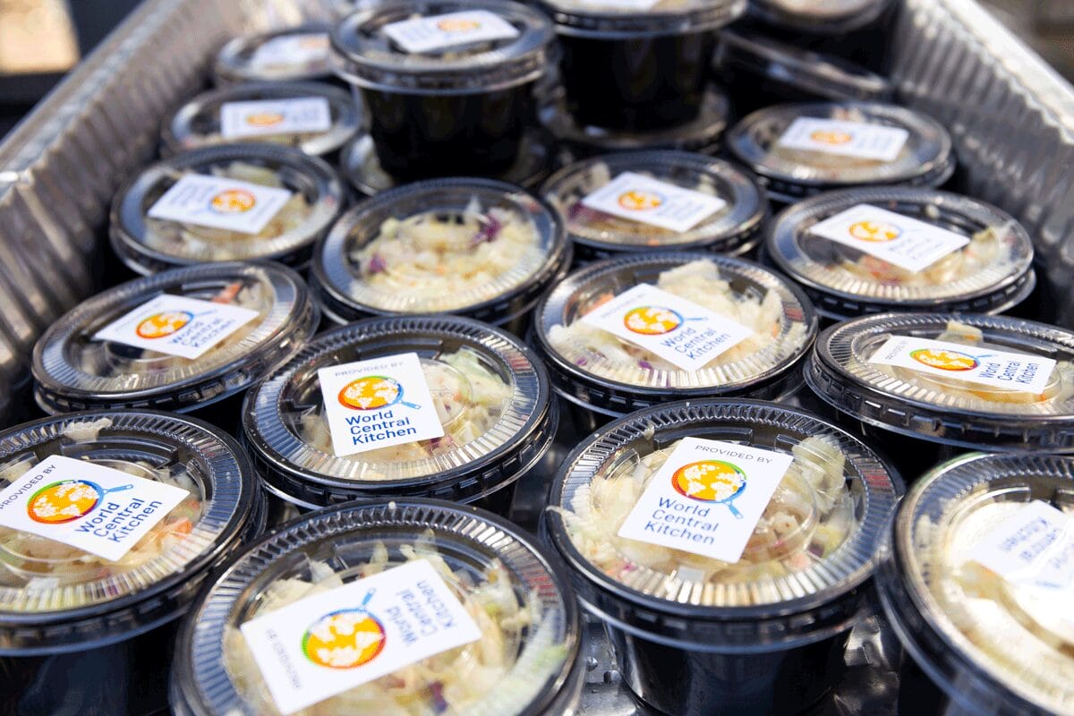 Salads packed in to-go containers with
